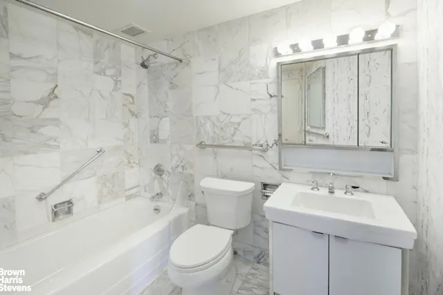 a view of a kitchen with a sink