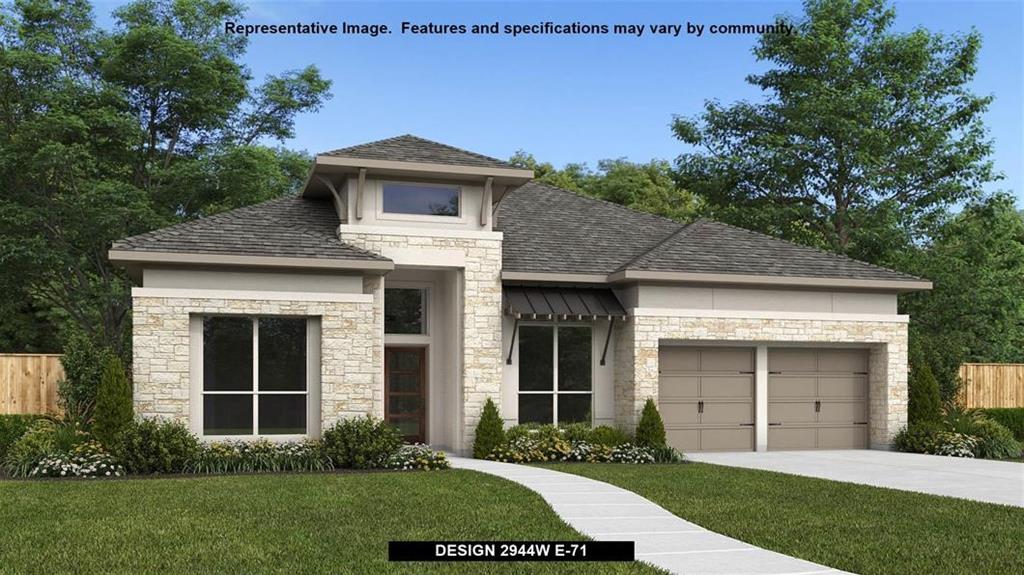 a view of a yard in front of a house with plants and large tree