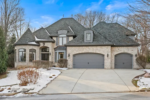 a front view of a house with yard