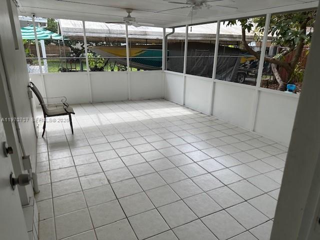 312 Southwest 76th Court, Unit 1 Miami, FL 33144 - Photo 15 of 18 a view of empty room with wooden floor