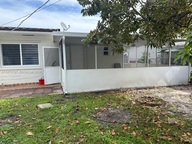 312 Southwest 76th Court, Unit 1 Miami, FL 33144 - Photo 18 of 18 a view of back yard of the house