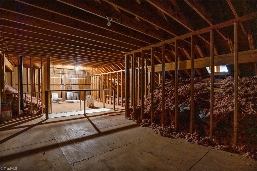 1255 Stadler Ridge Road Winston-Salem, NC 27106 - Photo 20 of 21 Permanent stairs to floored upper level for potential additional bedrooms and bath.