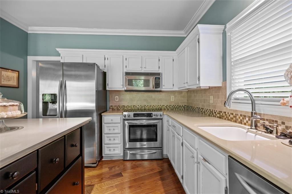 1255 Stadler Ridge Road Winston-Salem, NC 27106 - Photo 8 of 21 Kitchen opens to Den