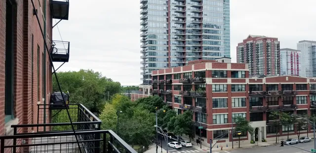 a view of balcony with a street