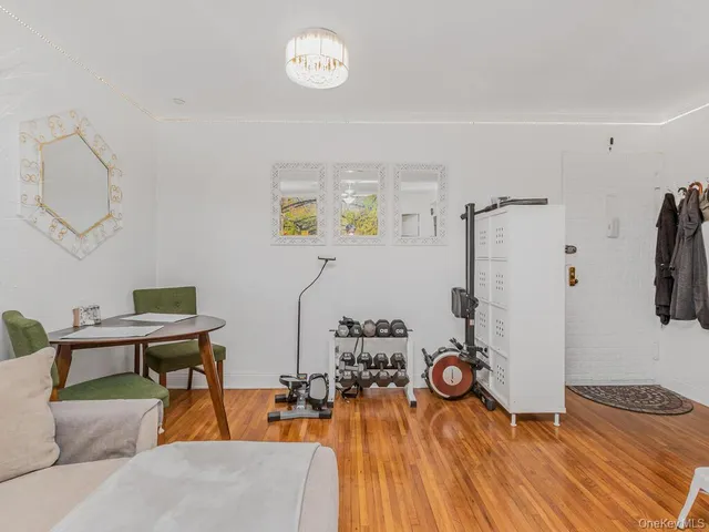 a kitchen with a refrigerator and cabinets