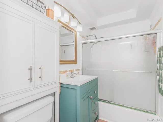 an outdoor space with seating area and trees around