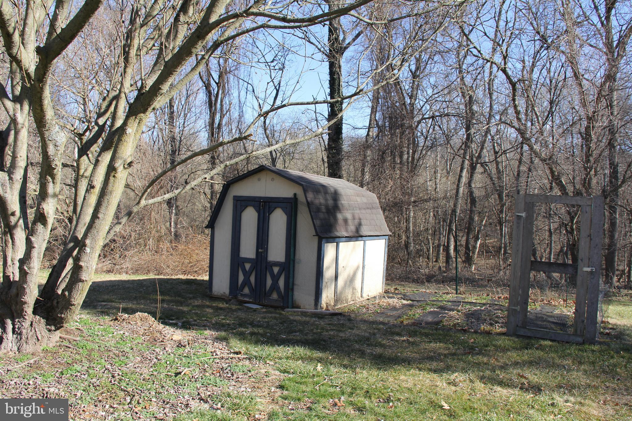 Large Shed included with a Fenced Garden Area