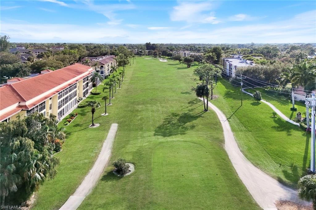 201 Quail Forest Boulevard, Unit 101 Naples, FL 34105 - Photo 29 of 32 an aerial view of a football ground