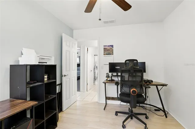a view of a workspace with furniture
