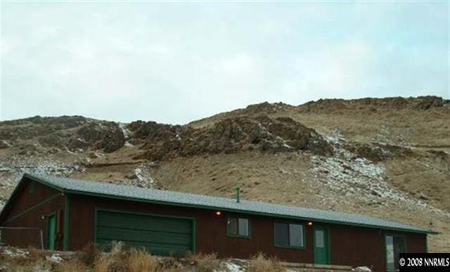 1000 Ironwood Road Reno, NV 89510 - Photo 1 of 4 a view of a mountain from a balcony