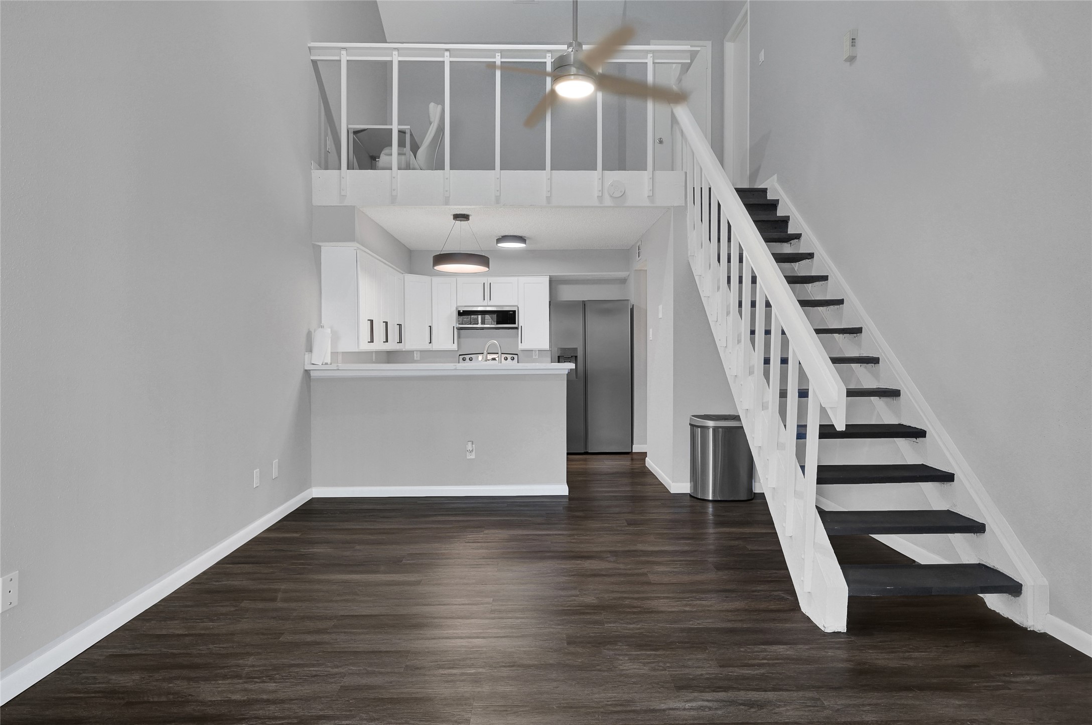 12111 Lemon Ridge Lane, Unit 121 Houston, TX 77035 - Photo 2 of 25 a view of entryway and hall with wooden floor