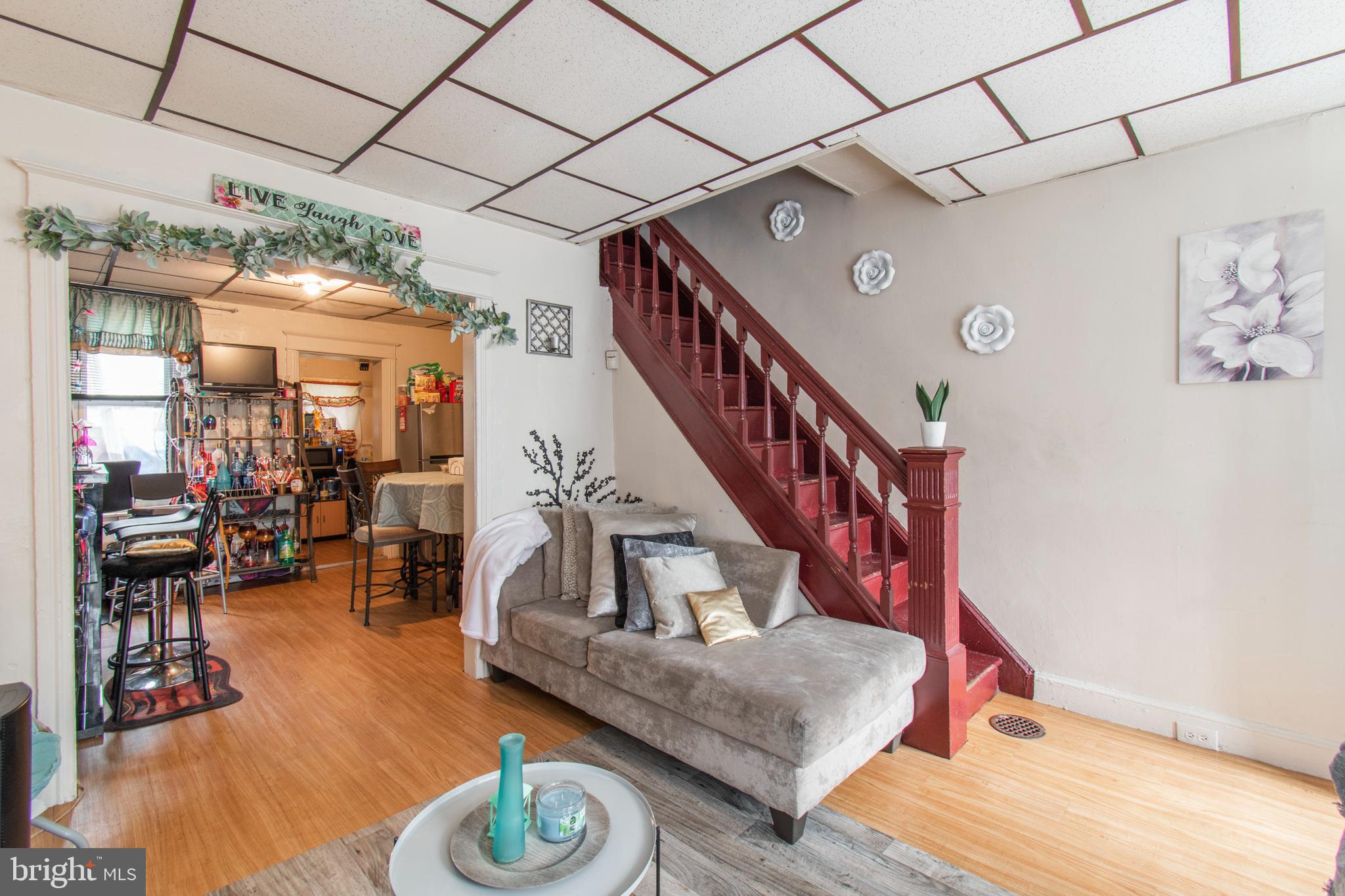 3317 Malta Street Philadelphia, PA 19134 - Photo 4 of 17 a living room with furniture and a table