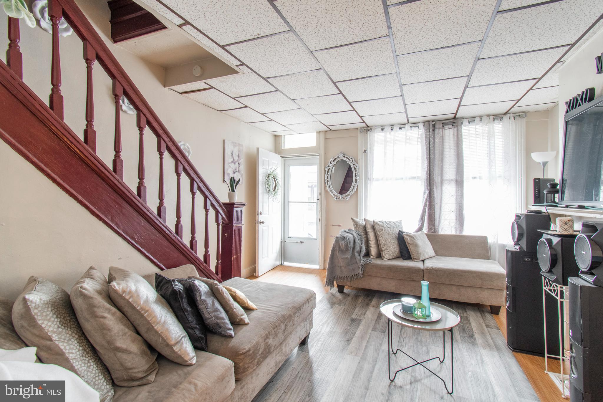 3317 Malta Street Philadelphia, PA 19134 - Photo 5 of 17 a living room with furniture and wooden floor