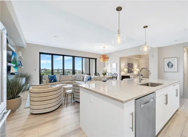 a room with view of living room and kitchen view
