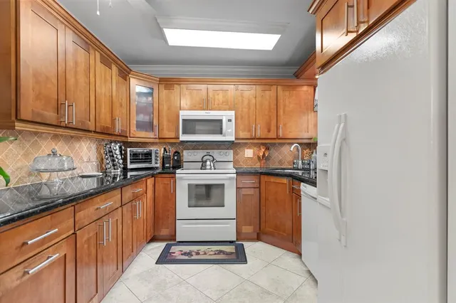 a dining room with furniture window and outside view