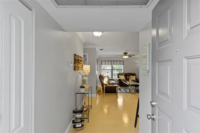 a view of a bathroom with sink and shower