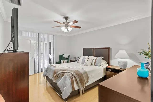 a view of a swimming pool with lounge chairs