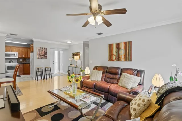 a spacious bedroom with a bed and furniture