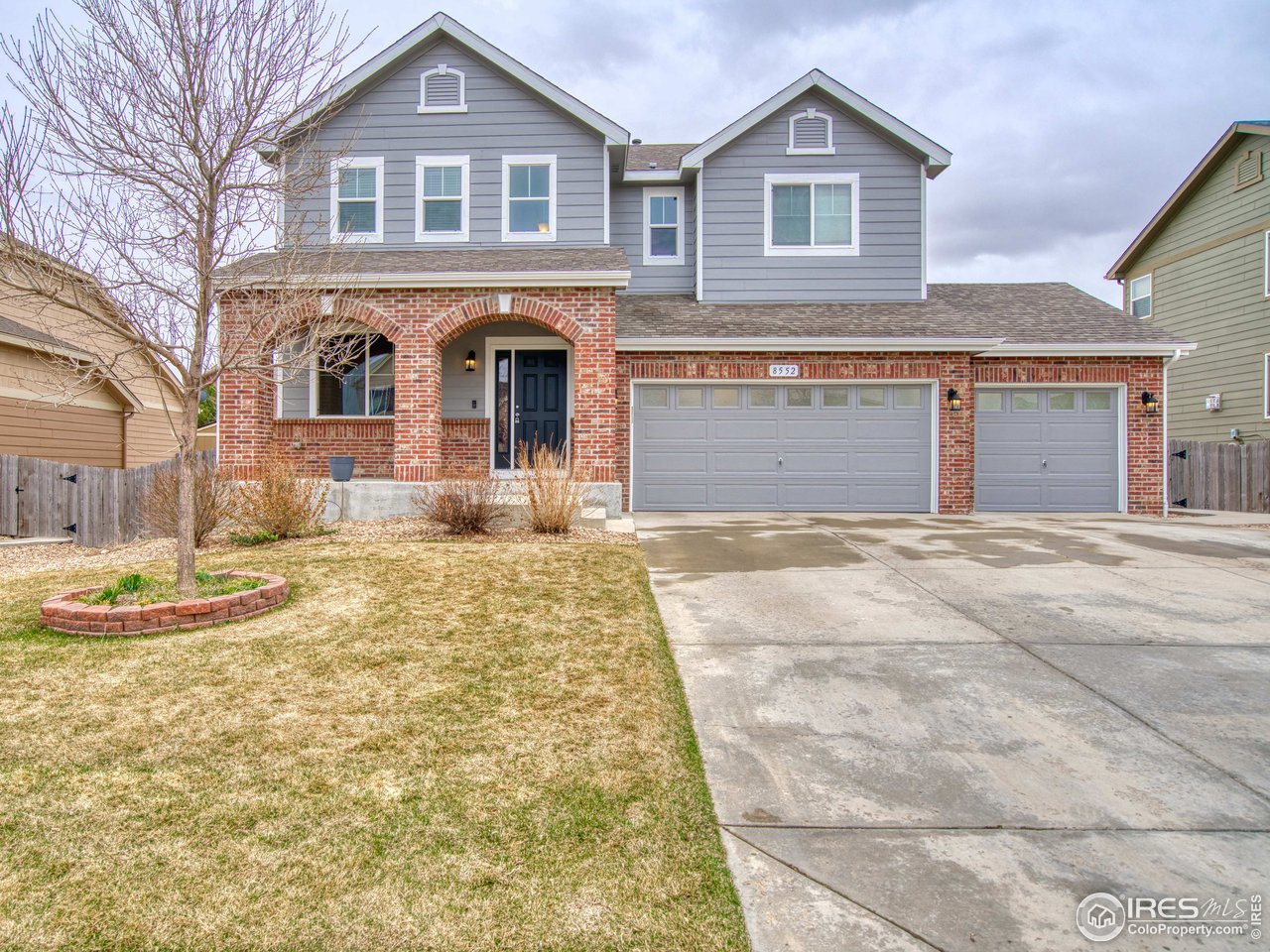8552 Raspberry Drive Frederick, CO 80504 - Photo 1 of 40 a front view of a house with a yard