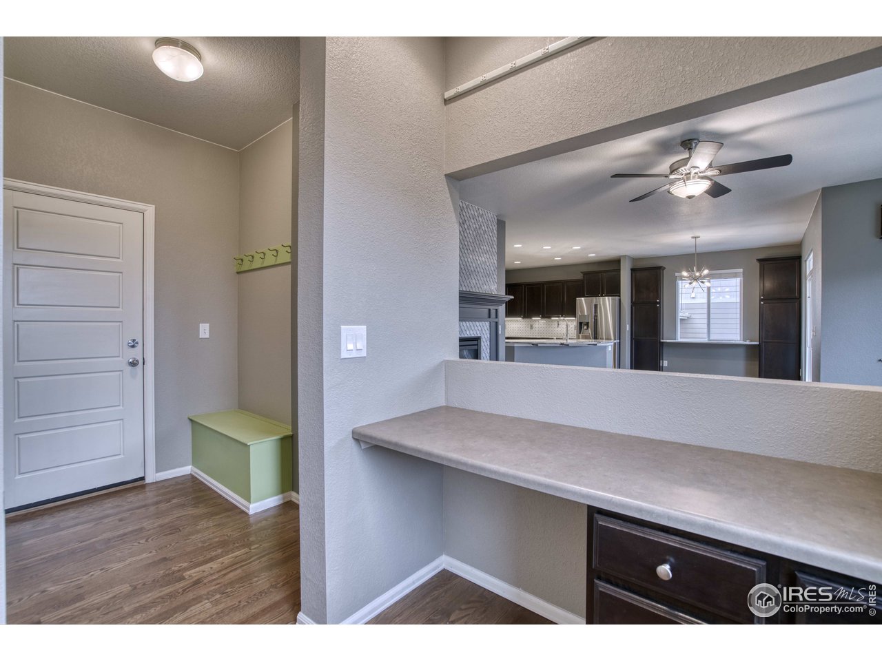 8552 Raspberry Drive Frederick, CO 80504 - Photo 16 of 40 a living room with furniture and a wooden floor