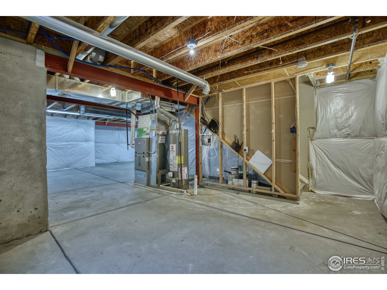 8552 Raspberry Drive Frederick, CO 80504 - Photo 30 of 40 a view of a room with gym equipment