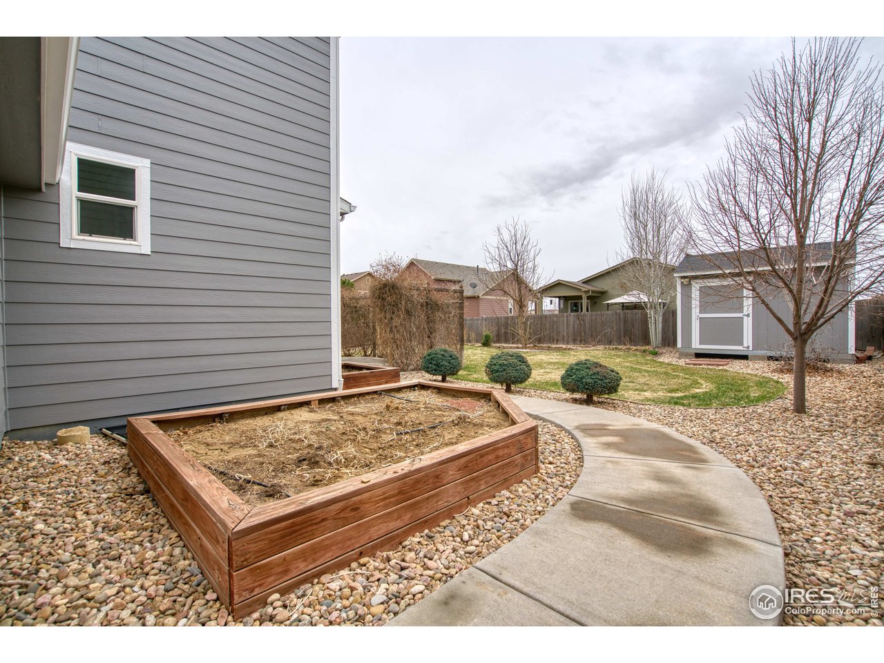 8552 Raspberry Drive Frederick, CO 80504 - Photo 38 of 40 a view of a house with backyard