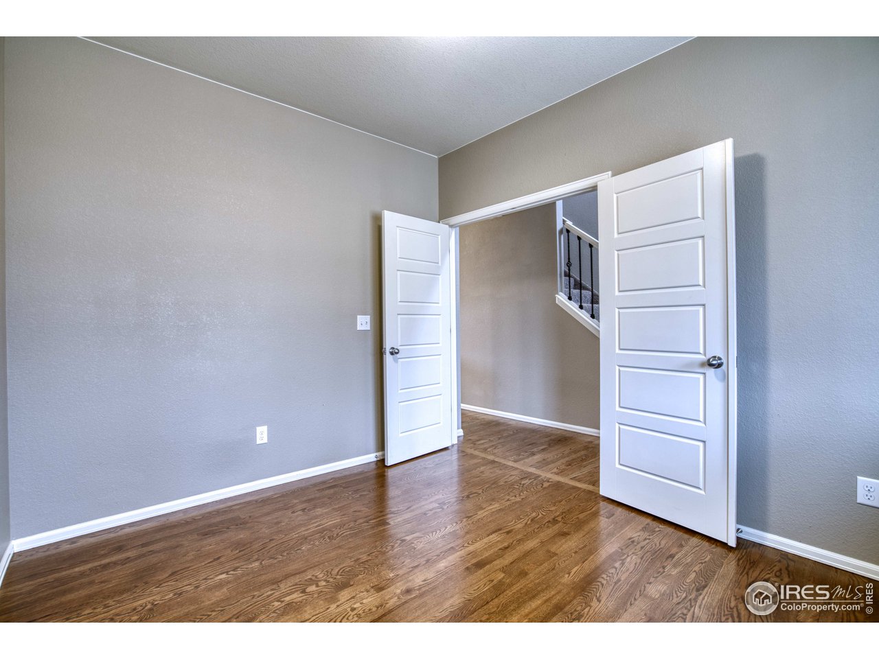 8552 Raspberry Drive Frederick, CO 80504 - Photo 4 of 40 an empty room with wooden floor