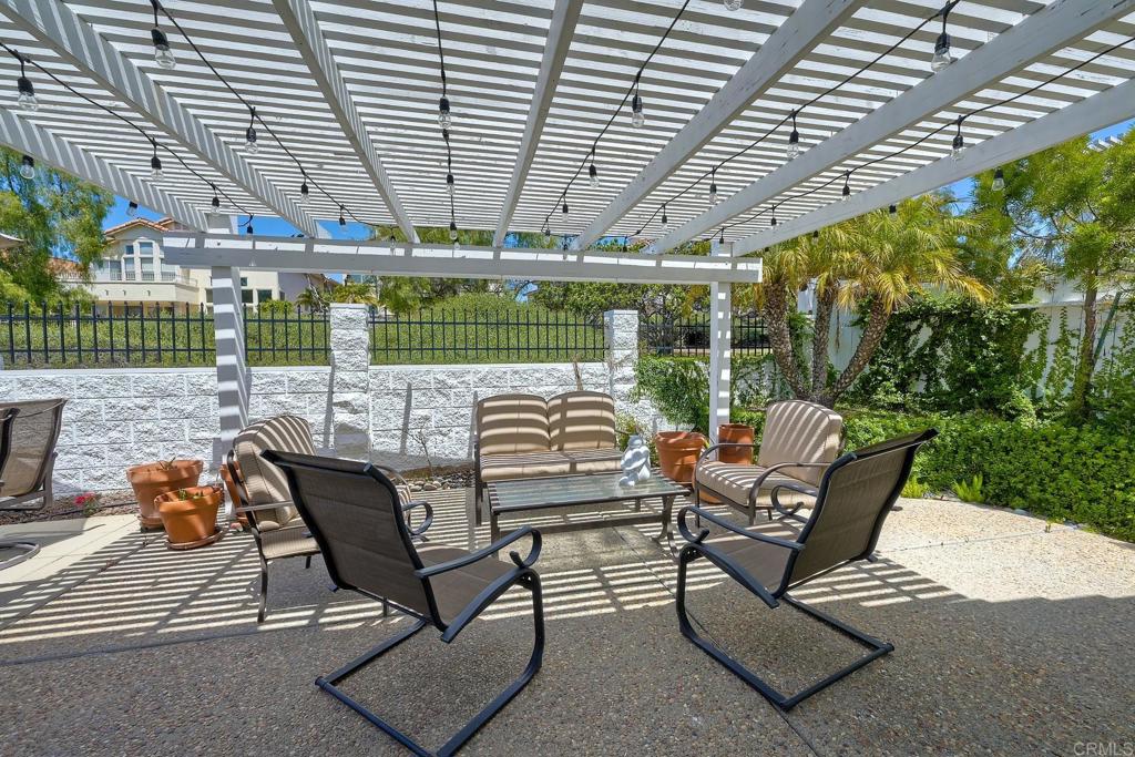 3730 Via Del Rancho Oceanside, CA 92056 - Photo 21 of 22 a view of a chairs and table in patio