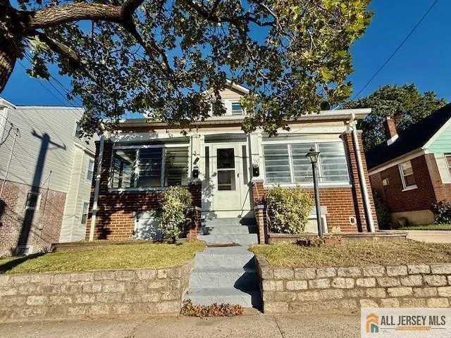 front view of house with a yard