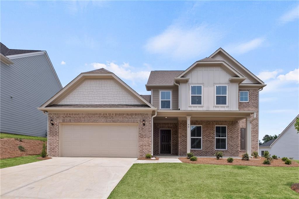 40 Riverclub Road Acworth, GA 30101 - Photo 1 of 1 a front view of a house with a yard and garage