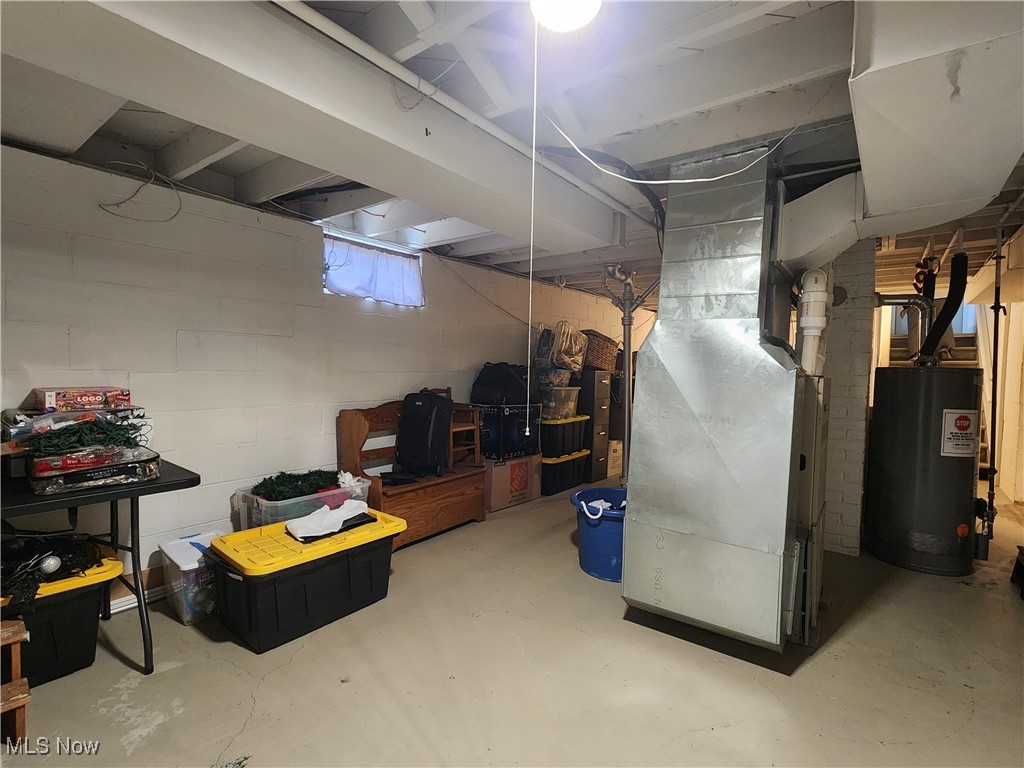 667 Sterling Road Wickliffe, OH 44092 - Photo 27 of 41 Unfinished basement with water heater and heating unit