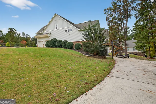a living room with furniture fireplace and a flat screen tv