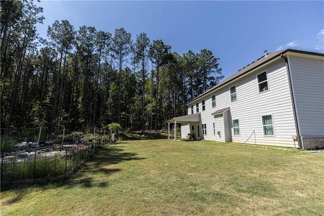 a room with gym equipment and a window