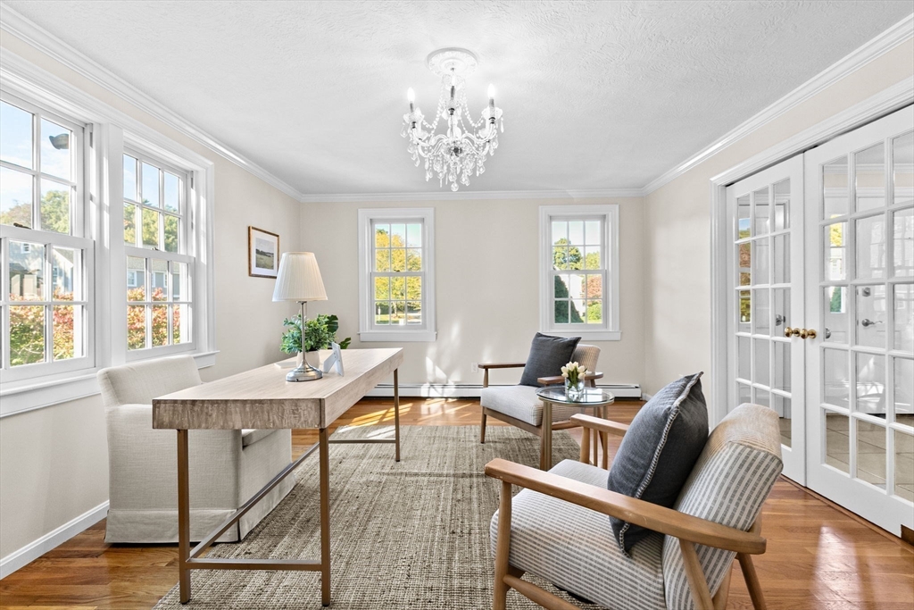 2 Windward Lane Scituate, MA 02066 - Photo 13 of 42 a view of a dining room with furniture window and wooden floor