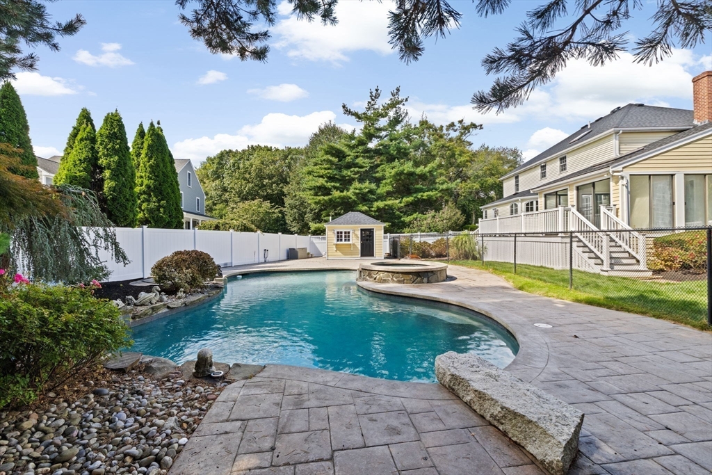 2 Windward Lane Scituate, MA 02066 - Photo 6 of 42 a view of a swimming pool with a patio