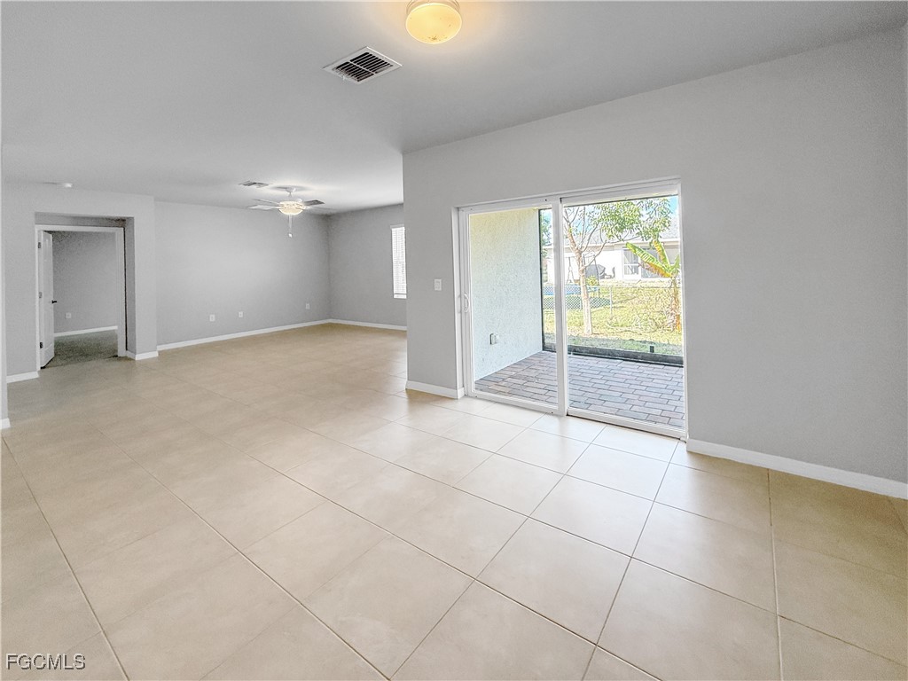8357 Matanzas Road Fort Myers, FL 33967 - Photo 13 of 25 en empty room with windows