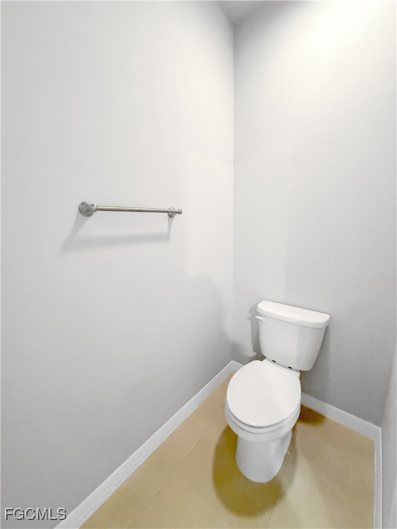 8357 Matanzas Road Fort Myers, FL 33967 - Photo 21 of 25 a white toilet sitting next to a white sink