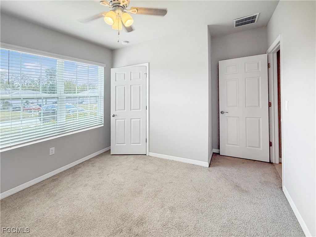 8357 Matanzas Road Fort Myers, FL 33967 - Photo 3 of 25 a view of an empty room with a window