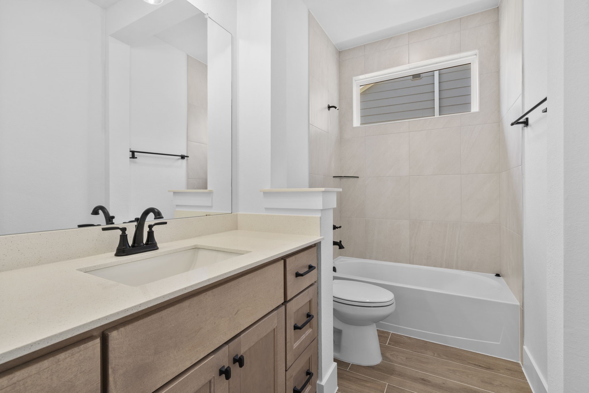 2910 Peach Vly Road Fulshear, TX 77423 - Photo 7 of 35 a bathroom with a sink a toilet and shower