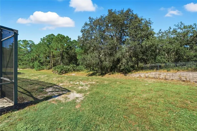 a view of a yard with an outdoor space