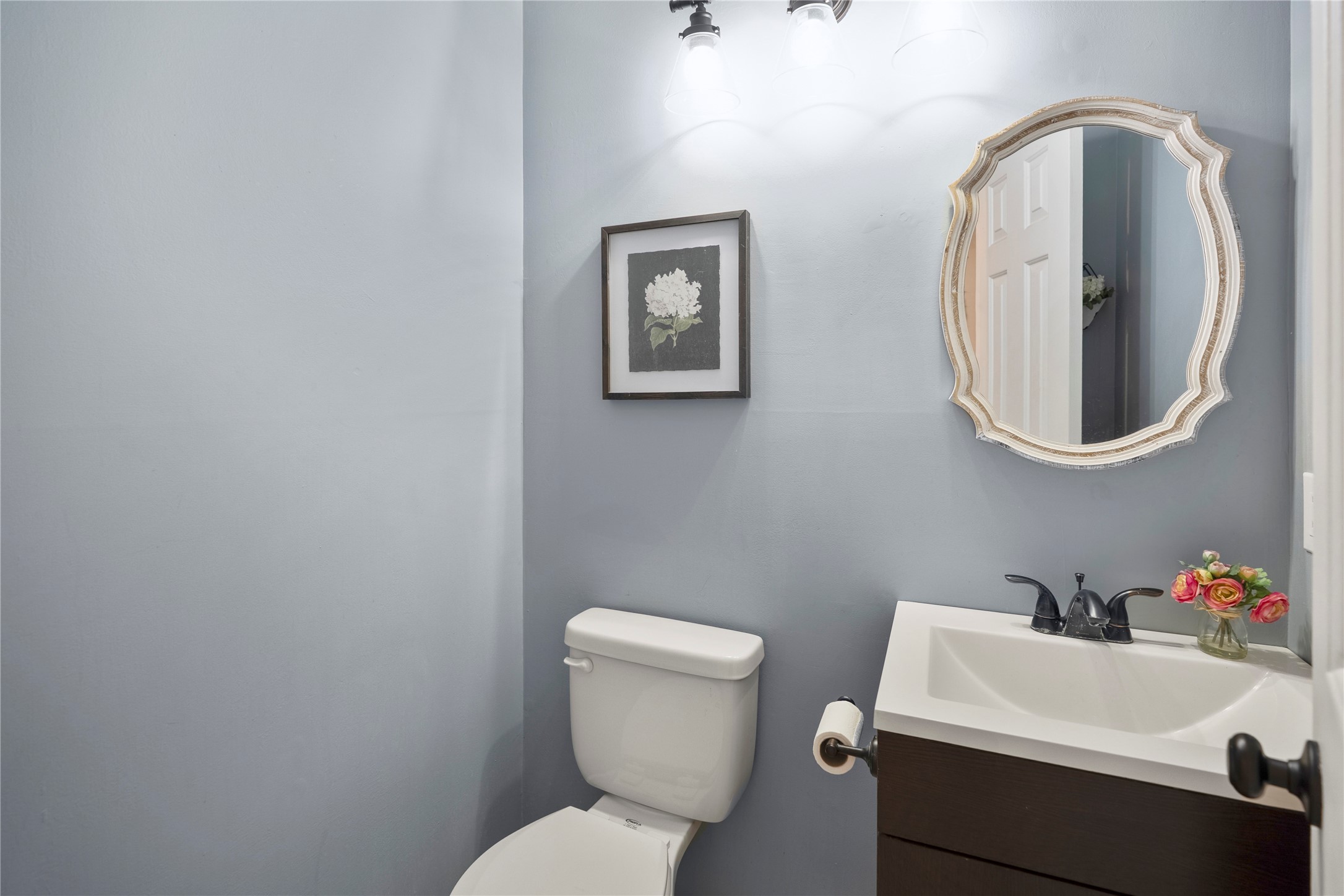 12224 Gun Oak Place Spring, TX 77380 - Photo 22 of 42 Conveniently located guest bath on first floor with clean finishes and thoughtful accessibility.