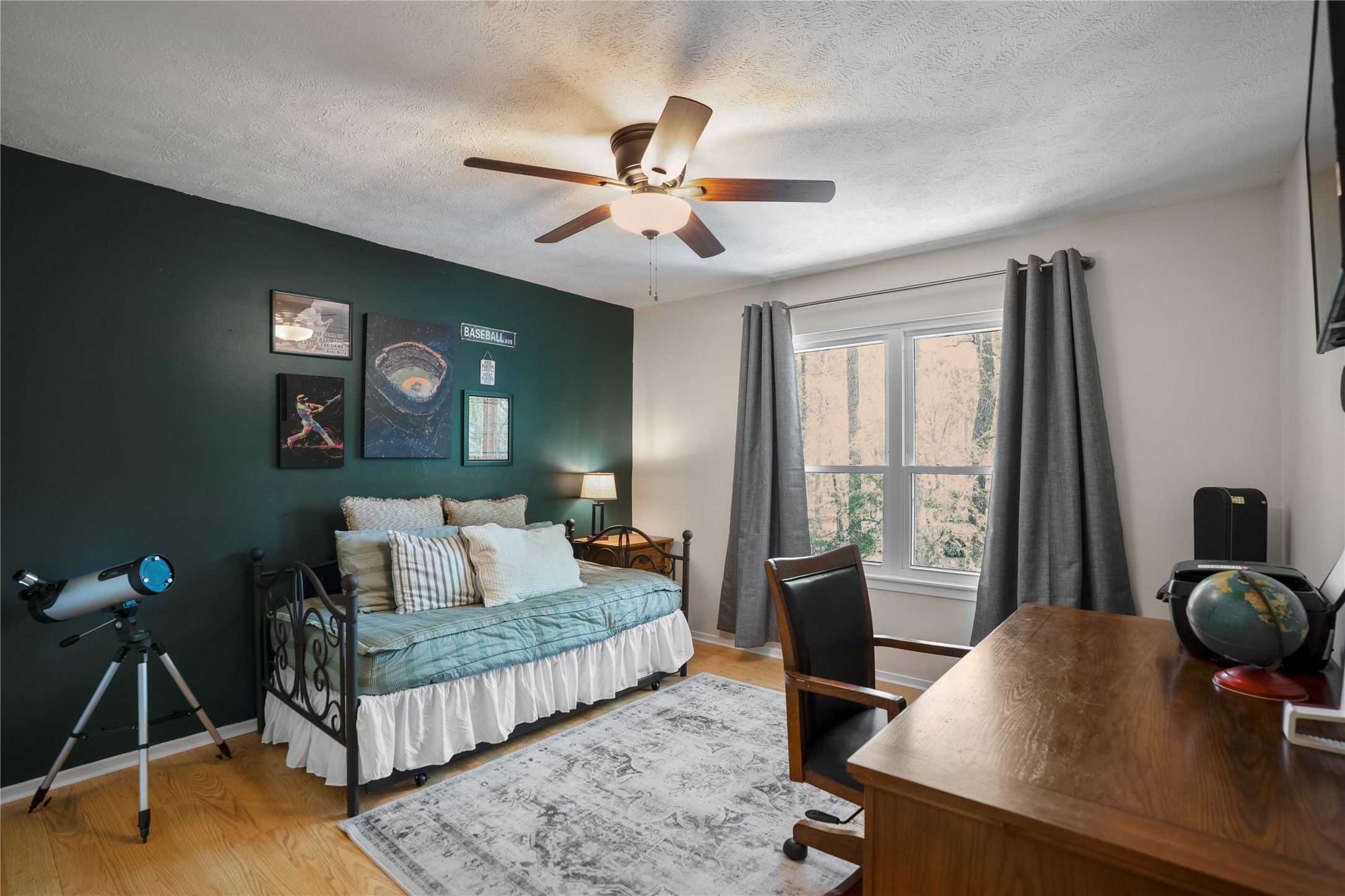 12224 Gun Oak Place Spring, TX 77380 - Photo 25 of 42 Spacious bedroom offering room to personalize, whether for rest, study, or creativity.