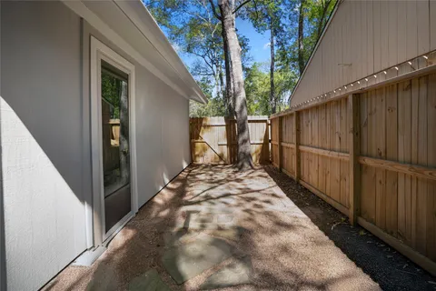 a view of a backyard with pathway
