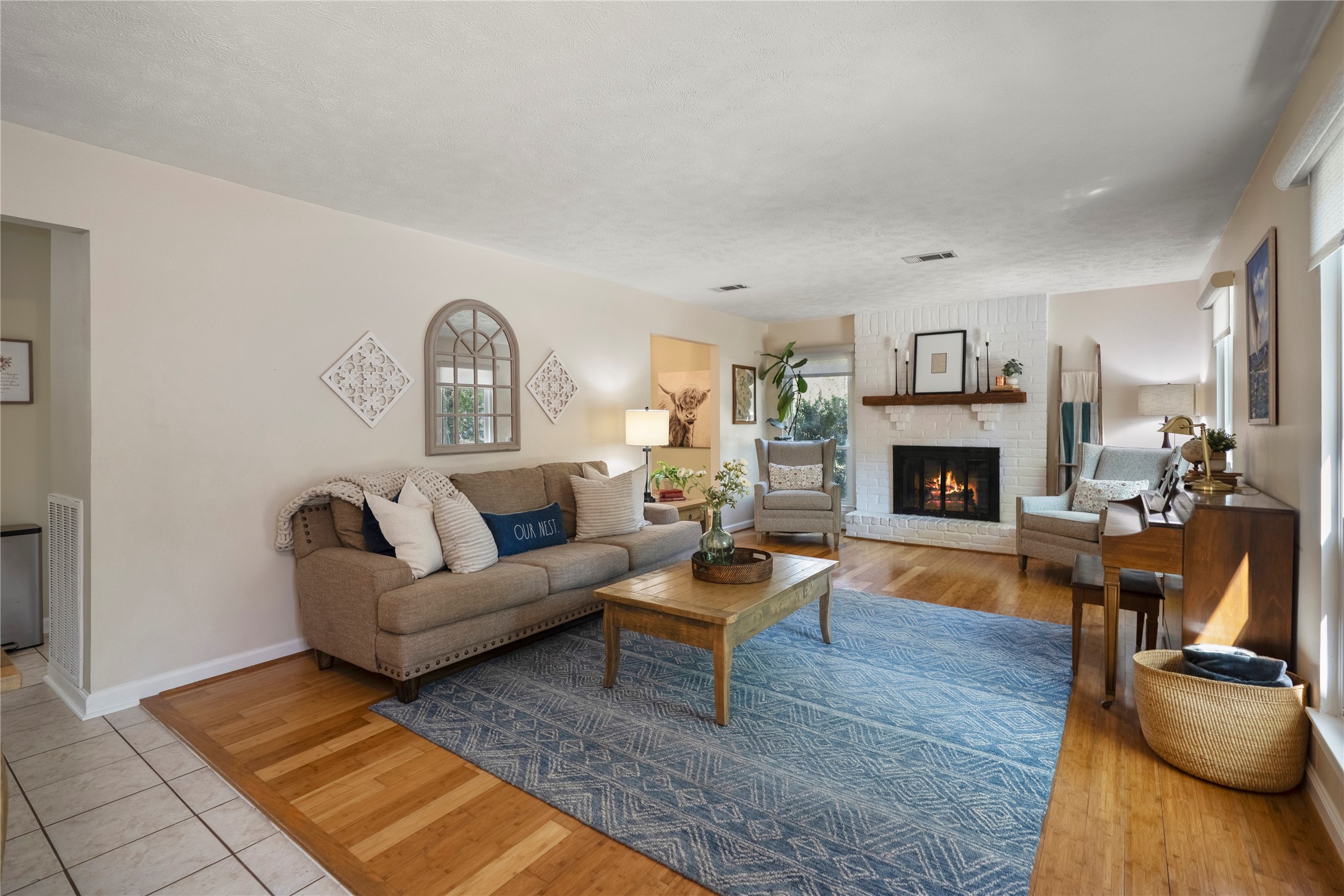 12224 Gun Oak Place Spring, TX 77380 - Photo 6 of 42 a living room with furniture and a fireplace