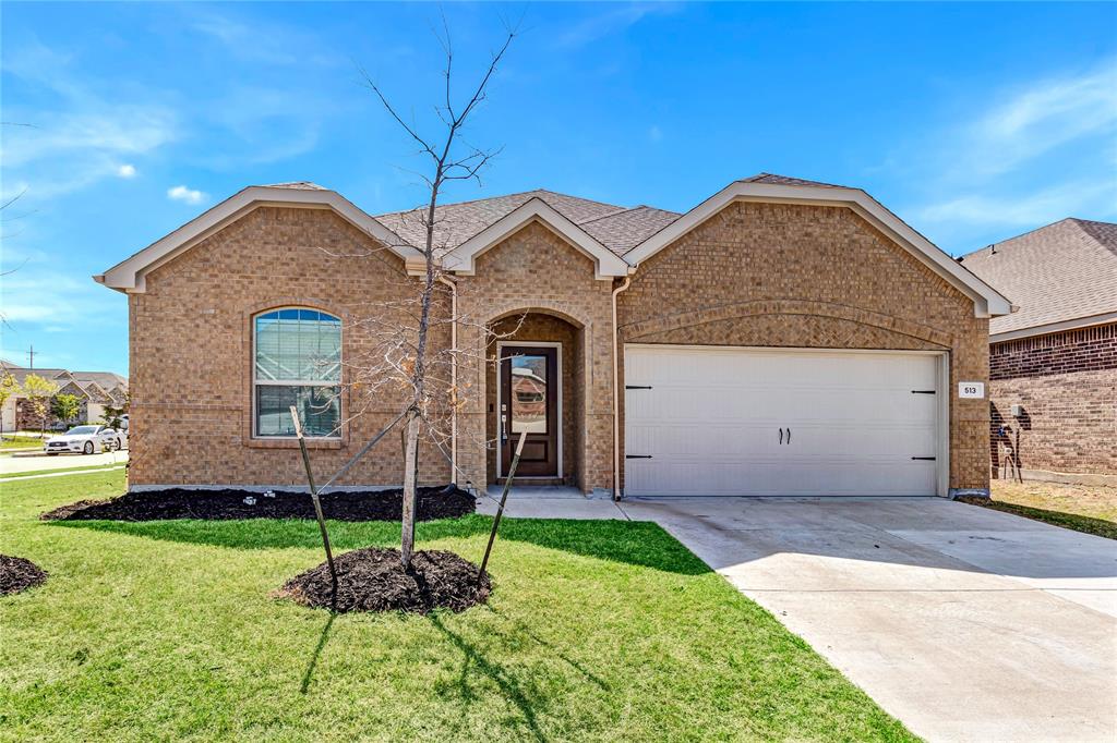 513 Robinson Way Fate, TX 75189 - Photo 1 of 1 a front view of a house with a yard