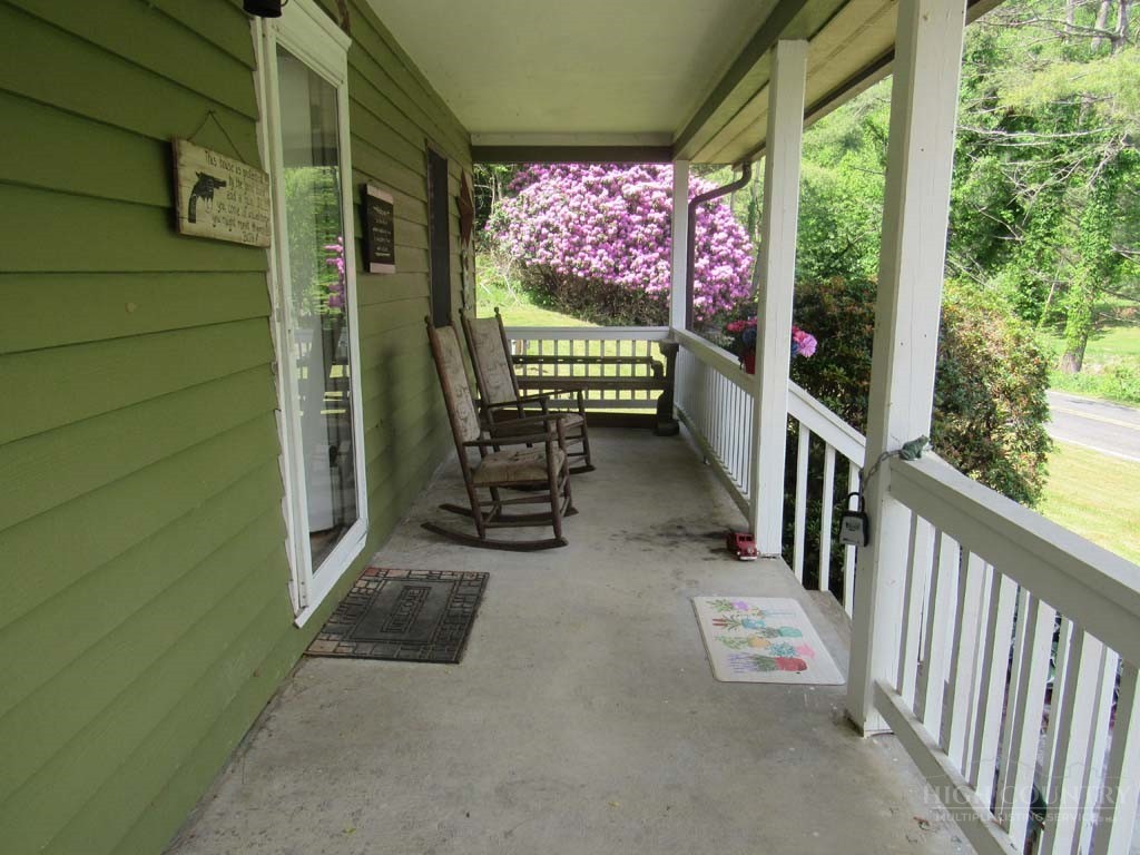 805 Ed Little Road Warrensville, NC 28693 - Photo 13 of 49 a view of outdoor space with seating area