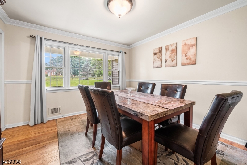 1 Oak Grove Road Flemington, NJ 08822 - Photo 7 of 29 a view of a dining room with furniture window and outside view