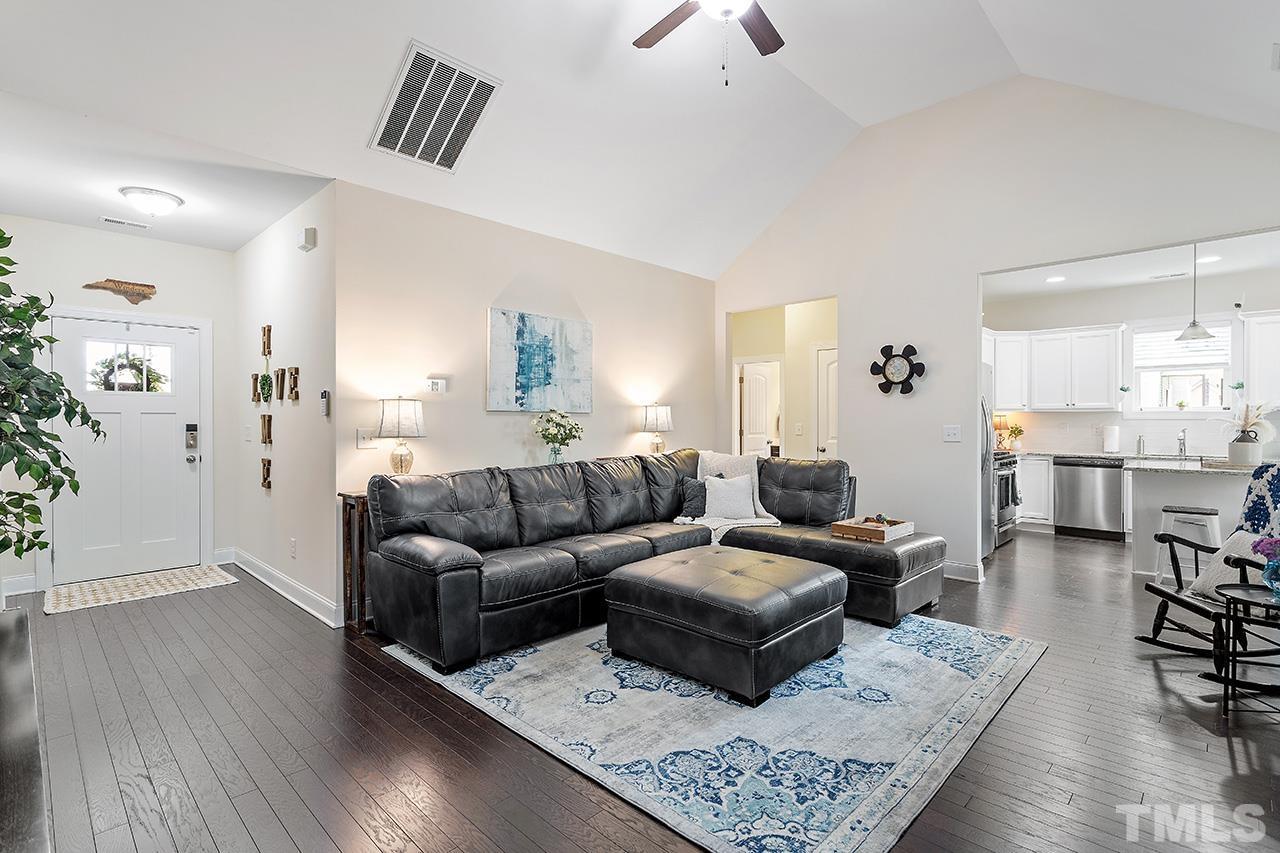 3622 Pine Needles Drive Wake Forest, NC 27587 - Photo 11 of 35 a living room with furniture and wooden floor