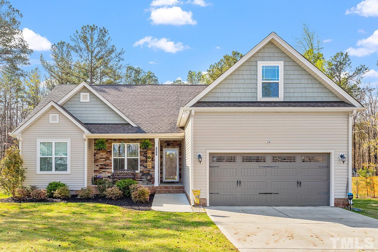 3622 Pine Needles Drive Wake Forest, NC 27587 - Photo 2 of 35 a view of a house with a swimming pool