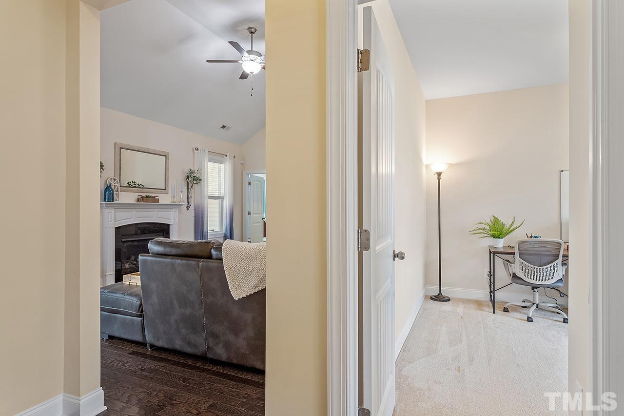 3622 Pine Needles Drive Wake Forest, NC 27587 - Photo 23 of 35 a view of kitchen and living room